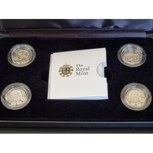 46 - Coins: a 2010 Royal Mint 'Four Cities' silver proof Piedfort collection, containing four £1 coins, w... 