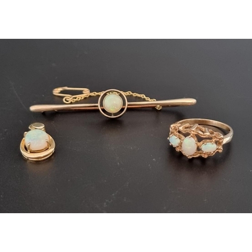 469 - A yellow gold and opal three stone ring, stamped '9ct', size N 1/2; together with an opal bar brooch... 