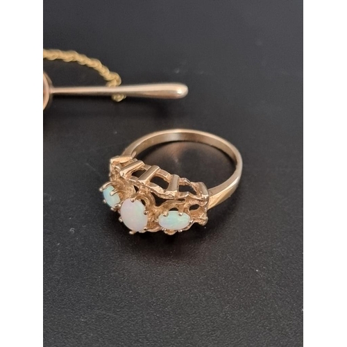 469 - A yellow gold and opal three stone ring, stamped '9ct', size N 1/2; together with an opal bar brooch... 