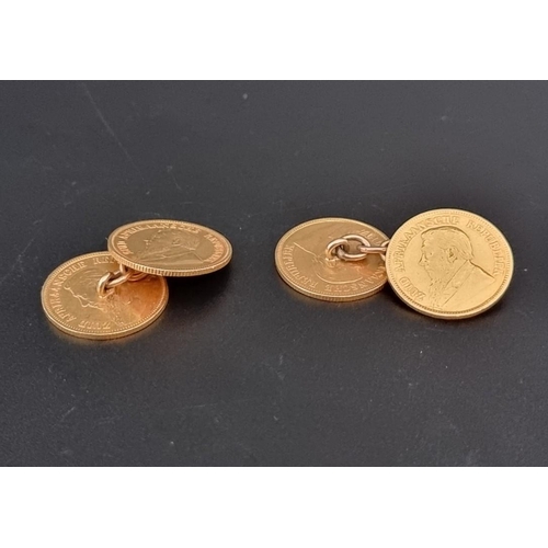 474 - A pair of South African gold half pond coin cufflinks, the four coins dated 1894, 1895 and 1897.... 