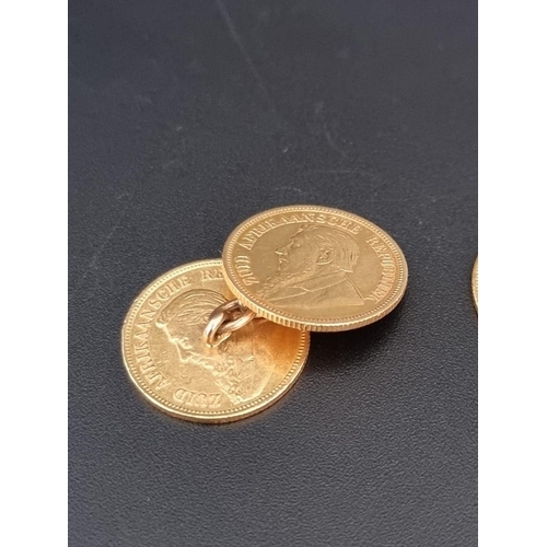 474 - A pair of South African gold half pond coin cufflinks, the four coins dated 1894, 1895 and 1897.... 