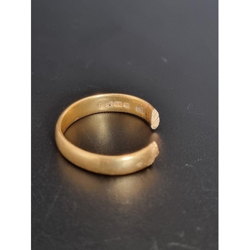 477 - A 22ct gold wedding band, 5g; together with a ring, stamped 18ct Plat, set one small diamond. (2)... 