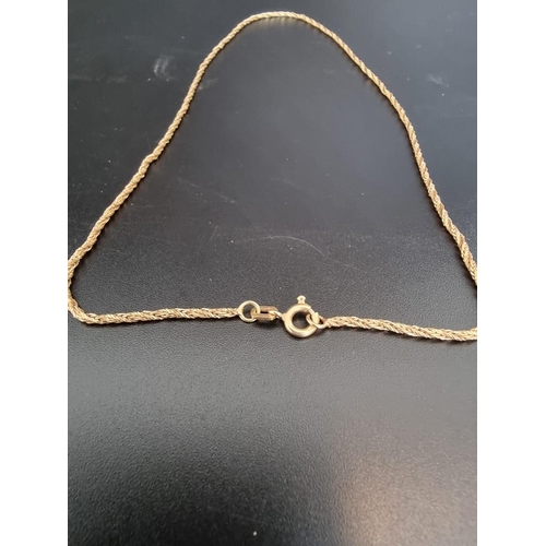 492 - A yellow metal chain, stamped 750, 22cm approximately.