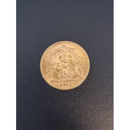 4A - Coins: a George V 1911 gold half sovereign.