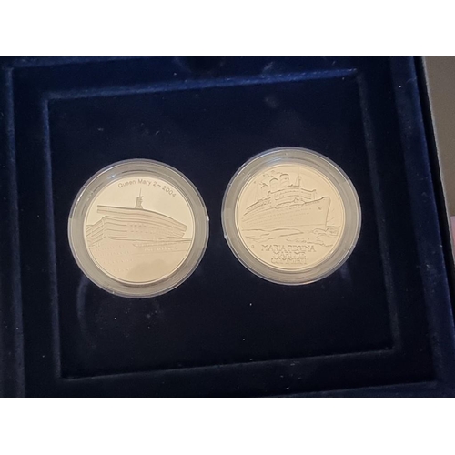 50 - Coins: a Royal Mint and Royal Mail 'Queen Mary and Queen Mary 2' set of two silver proof medals and ... 