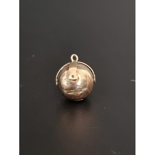 502 - A Masonic ball pendant, stamped 'Silver & Gold',  2.2cm diameter.