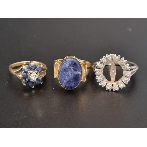 504 - Two yellow metal rings, set lapis lazuli and Sapphires and diamonds, each stamped 750; together with... 