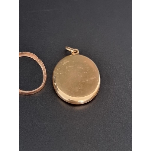 508 - A yellow metal locket, engraved 18ct, 31mm high.