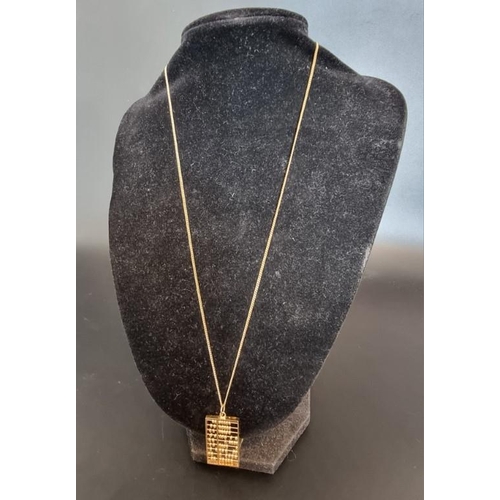 516 - A yellow metal abacus pendant, stamped '14k', 32mm, on a gold plated chain.