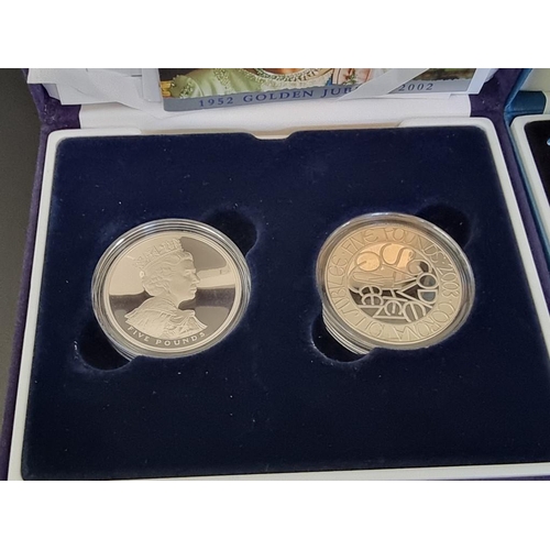 52 - Coins: a 2003 Royal Mint 'UK Silver Proof Pattern Collection', containing four £1 coins, with bookle... 
