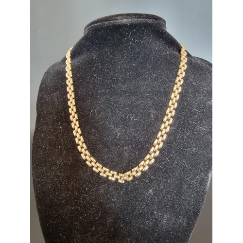 530 - A 9ct gold three row brick link necklace, 46cm, 18g.