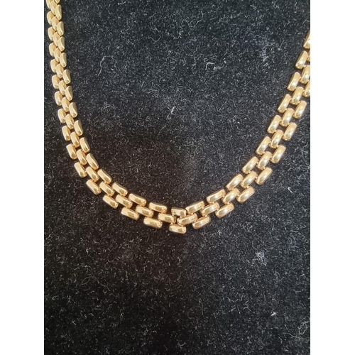 530 - A 9ct gold three row brick link necklace, 46cm, 18g.