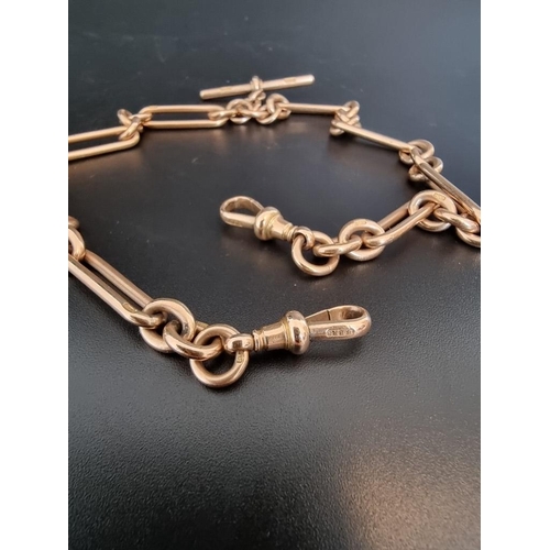 532 - An Edwardian yellow metal trombone link double Albert chain, each link stamped '9 375', 38cm long.... 