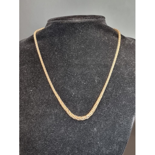 549 - A yellow metal woven graduated necklace, stamped 9ct, 44.5cm.