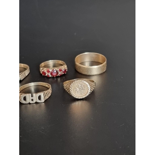 559 - Eleven various yellow metal and 9ct gold rings.