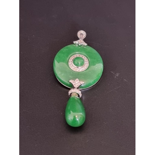 566 - A Chinese white metal, jadeite and diamond pendant, stamped 925, 6cm high.