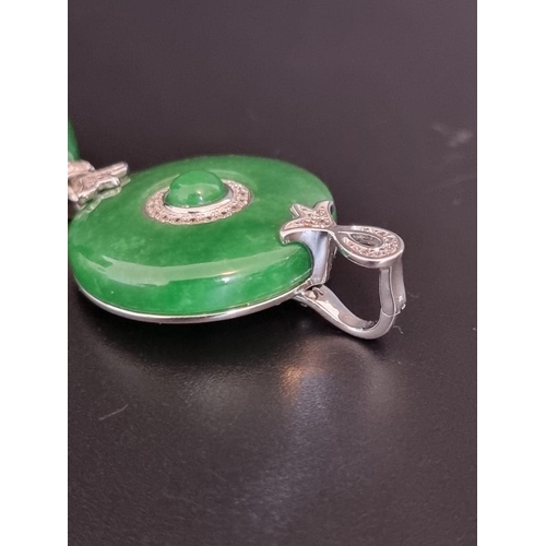 566 - A Chinese white metal, jadeite and diamond pendant, stamped 925, 6cm high.