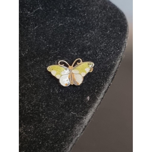 569 - A Norwegian white metal and enamel butterfly brooch, stamped 'Sterling', 24mm.