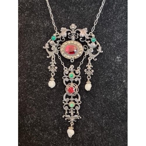 576 - A 19th century continental paste set pendant necklace, the pendant 7.5cm high.