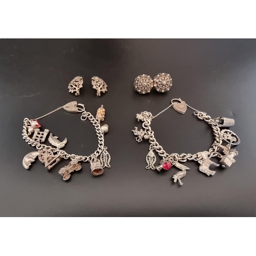 588 - Two white metal charm bracelets; together with a white metal brooch; and a white and yellow metal pa... 