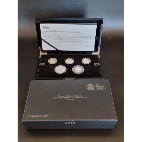 59 - Coins: a 2018 Royal Mint 'Silver Proof Piedfort Commemorative Coin Set' containing five coins, 50p t... 