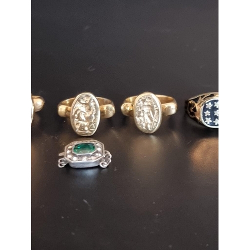 603 - Five various rings; together with a white metal clasp, set paste. (6)