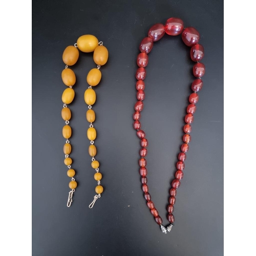 607 - Two vintage Bakelite graduated bead necklaces, 59cm and 57cm.