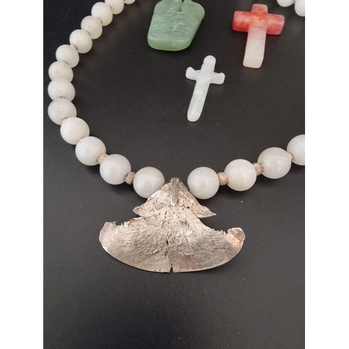 608 - A quartz necklace, with clasp stamped 925; together with three various stone pendants. (4)... 