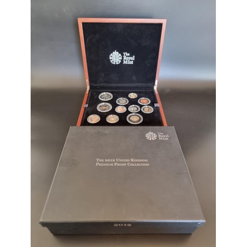 61 - Coins: a 2012 Royal Mint 'UK Premium Proof Set', containing eleven coins, with CoA No.1310/3500, box... 