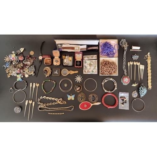 634 - A quantity of costume jewellery, watches and other items.