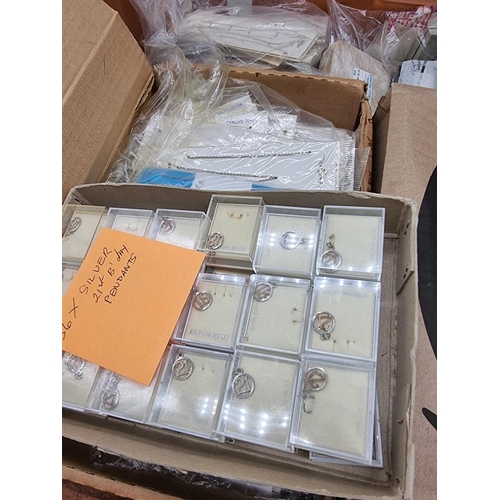 638 - A large quantity of white metal pendants, necklaces and similar. (large box)