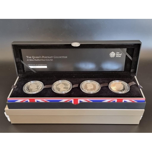 66 - Coins: a 2013 Royal Mint 'The Queen's Portrait' silver Piedford £5 collection, containing four coins... 