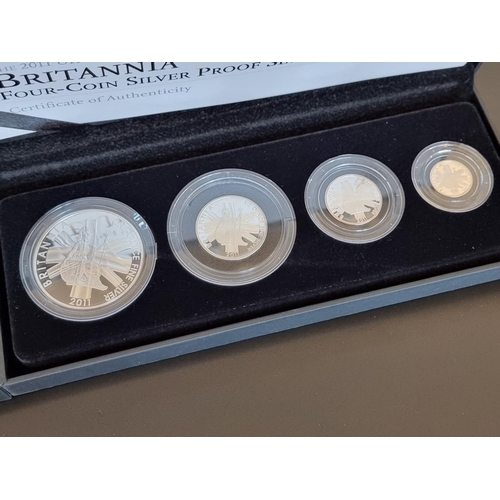 67 - Coins: a 2011 Royal Mint 'Silver Proof Britannia Collection' containing four coins, 20p to £2, with ... 