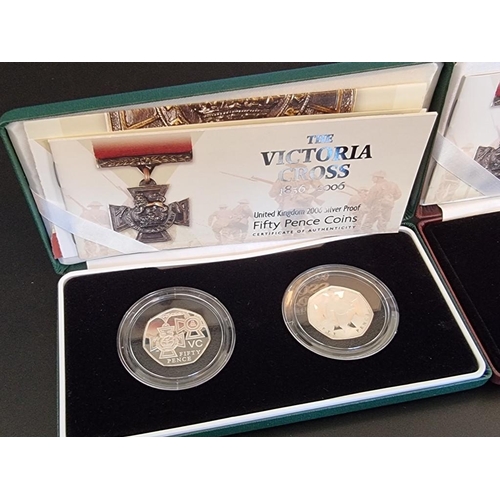 71 - Coins: two 2006 Royal Mint 'Victoria Cross 1856-2006' Piedfort silver proof 50p coin sets, each with... 