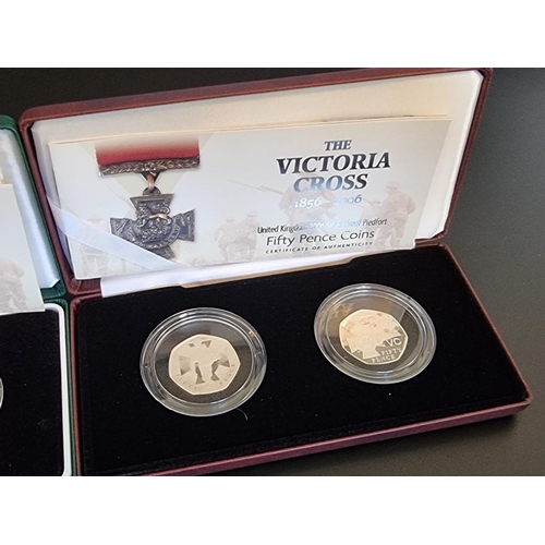 71 - Coins: two 2006 Royal Mint 'Victoria Cross 1856-2006' Piedfort silver proof 50p coin sets, each with... 