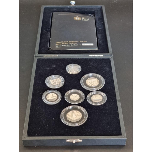 73 - Coins: a 2008 Royal Mint 'Royal Shield of Arms' silver proof Piedfort collection, containing seven c... 