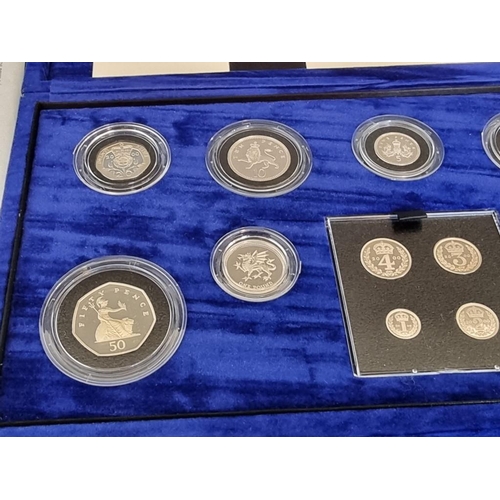 75 - Coins: a 2000 Royal Mint 'Millennium Silver Collection', containing nine silver proof coins and a Ma... 