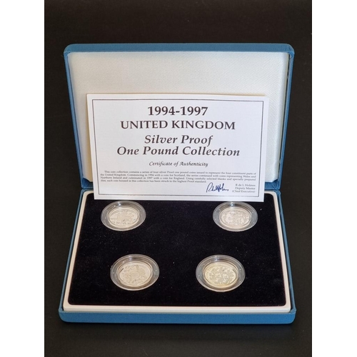 79 - Coins: a Royal Mint silver proof 'Piedfort One Pound Coin Collection', containing four coins dated 2... 