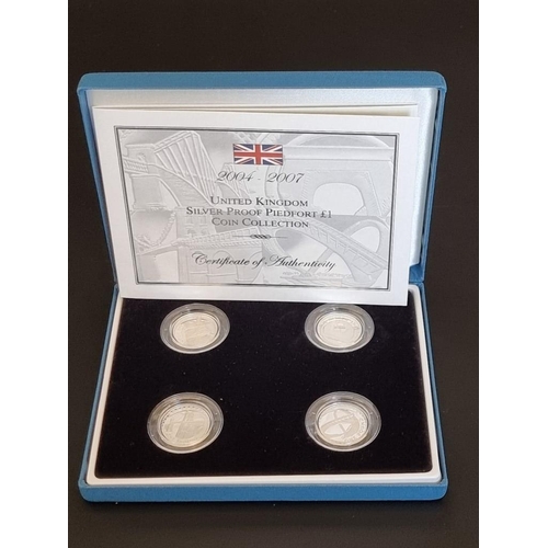 80 - Coins: a Royal Mint 'Silver Proof Piedfort One Pound Coin Collection', containing four coins dated 2... 