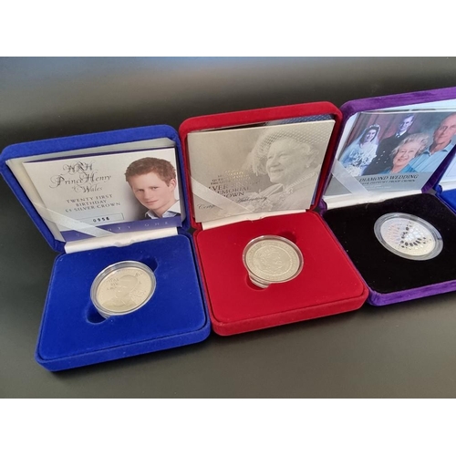 84 - Coins: five Royal Mint silver proof crowns; to include a Prince Harry 21st Birthday example and a 20... 