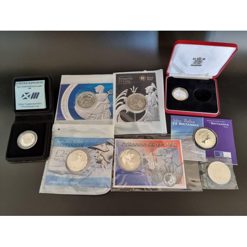 92 - Coins: six Royal Mint Britannia .999 1oz silver coins; together with two other silver coins. (8)... 