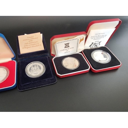 98 - Coins: fifteen various silver commemorative coins, issued by Gibraltar, St Helena, Guernsey and othe... 