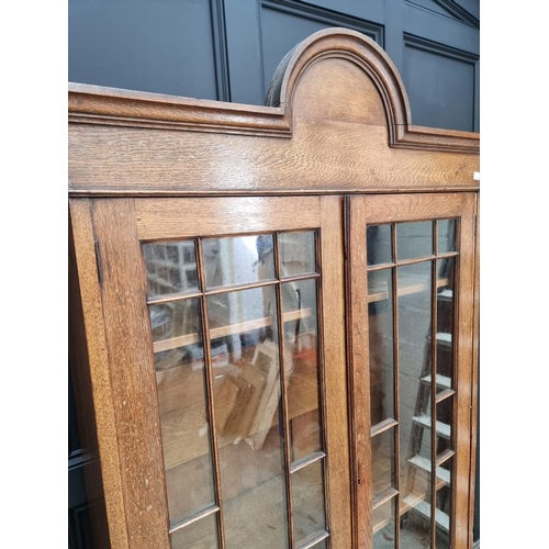 1005 - A 1920s oak bookcase, 94.5cm wide. 