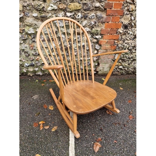 1012 - A vintage Ercol rocking chair. 
