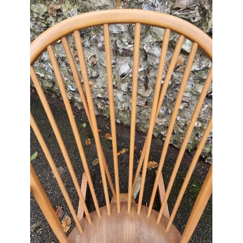 1012 - A vintage Ercol rocking chair. 