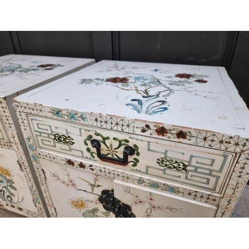 1024 - A pair of painted cupboards, 51cm wide, (a.f.). (2)