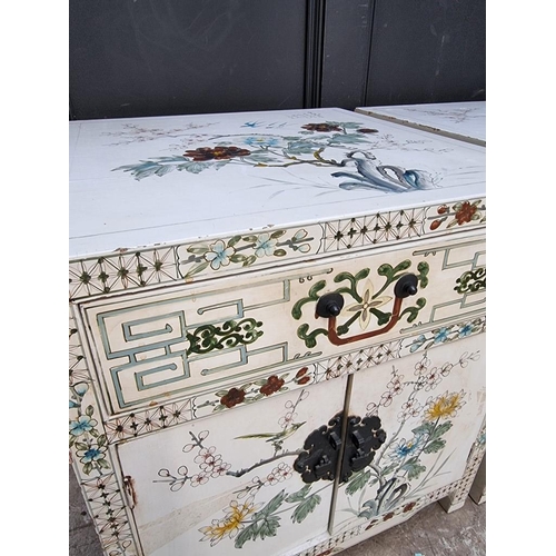 1024 - A pair of painted cupboards, 51cm wide, (a.f.). (2)