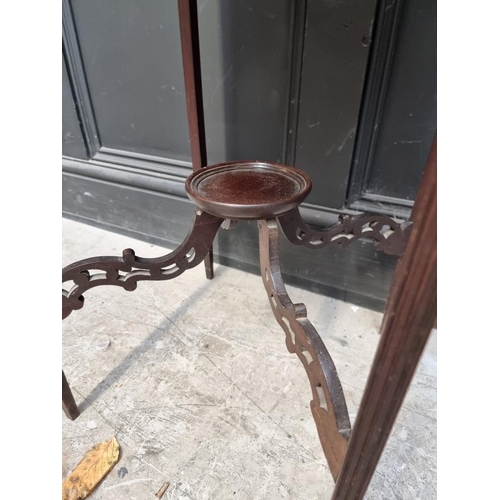 1034 - A small late Victorian carved mahogany square bijouterie table, with blind fret decoration, 39.... 