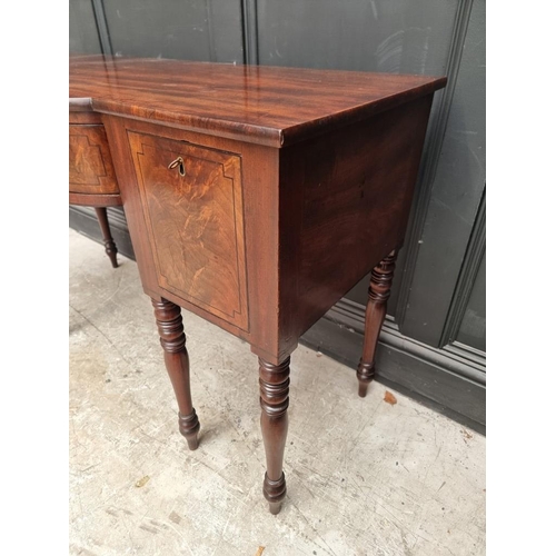 1044 - A small George IV figured mahogany and ebony strung bowfront sideboard, 122cm wide.