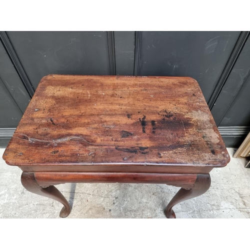 1046 - An 18th century mahogany centre table, 73.5cm wide, (s.d.).